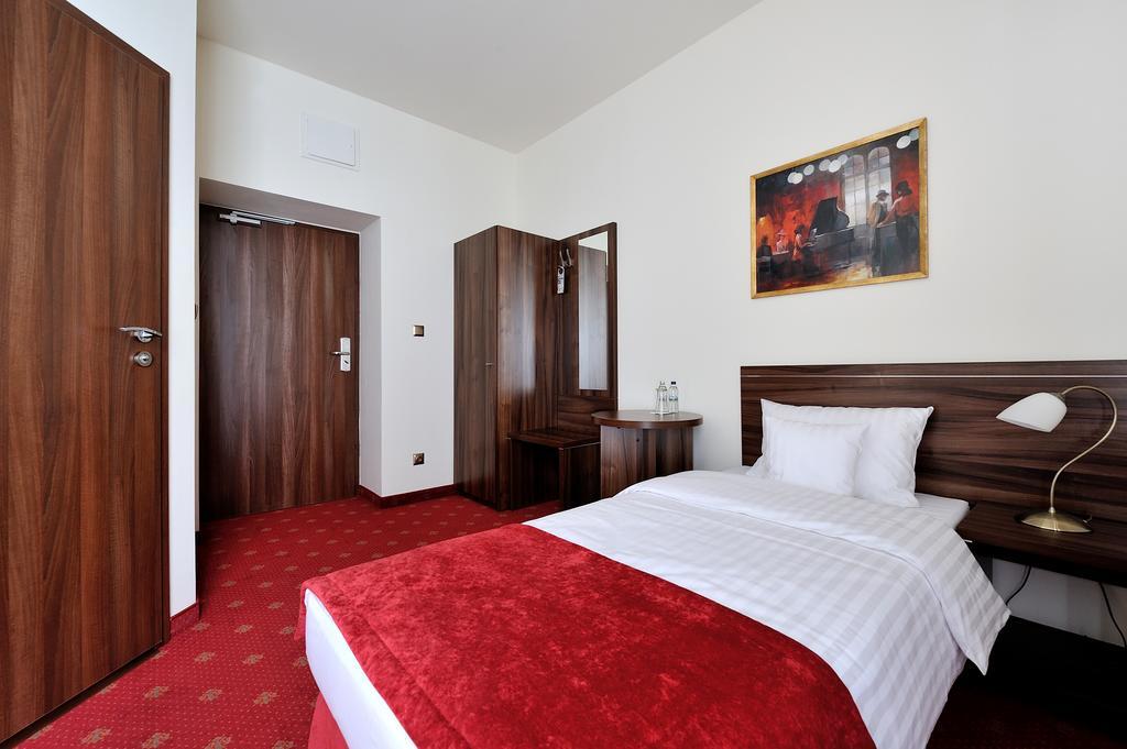 Hotel Centrum Sosnowiec Oda fotoğraf